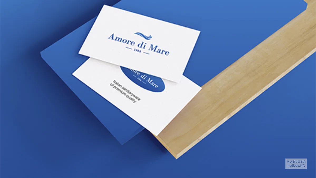 Amore di Mare - визитки компании на голубом фоне