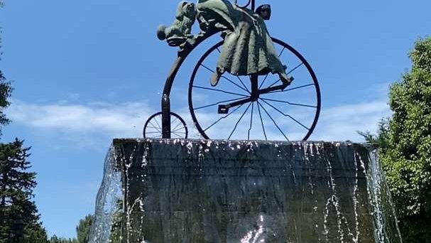 Fountain "Lady with a dog on a bicycle"