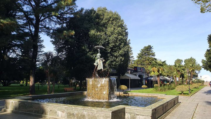 Fountain "Lady with a dog on a bicycle"