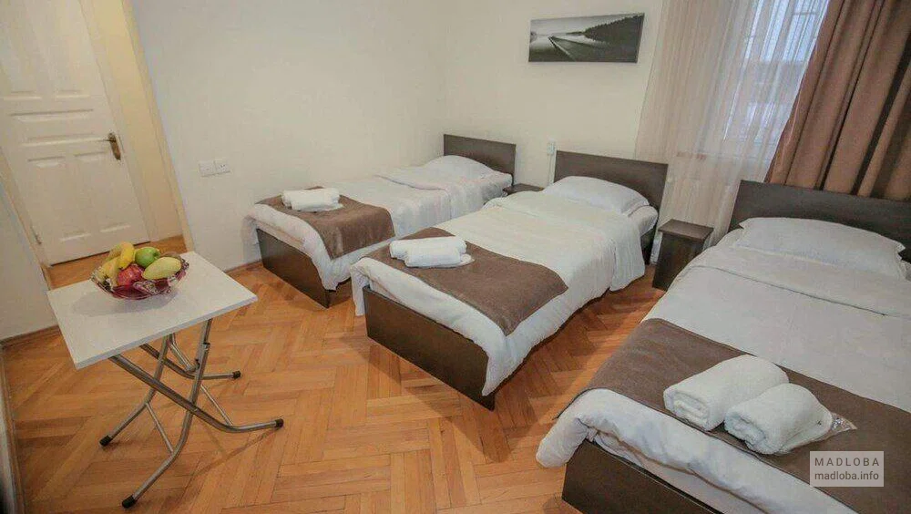 Laba Guest House кровати в номере