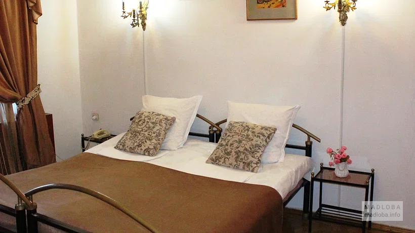 Кровать в Hotel Classic