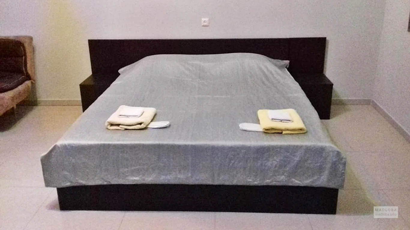 Кровать в Hotel Imaginarium