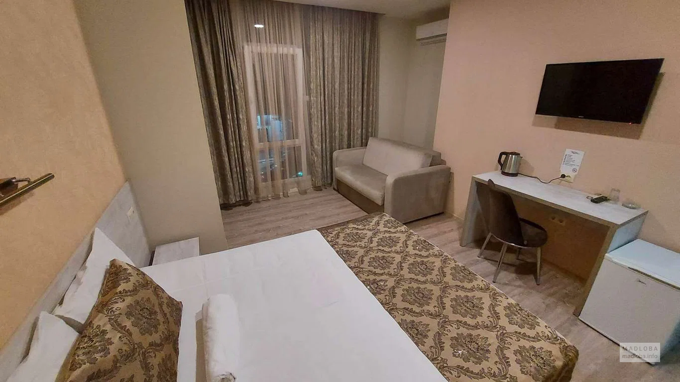 Интерьер номера в Hotel Elio Inn