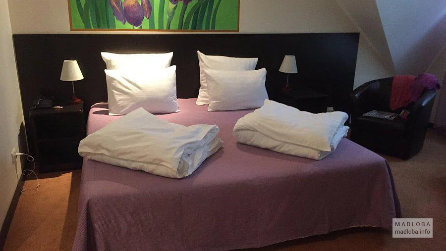 The interior of the bedroom at the Iris Hotel