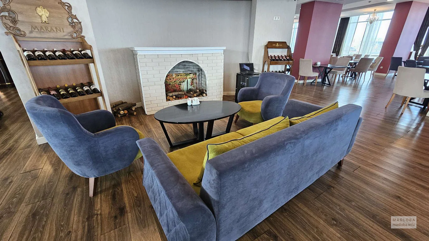 зона отдыха в JRW Welmond Hotel