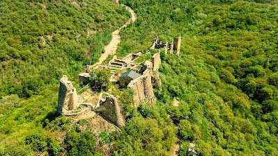 🚪 Ujarma Museum-Reserve: discover an ancient fortress where stones whisper and history comes to life!