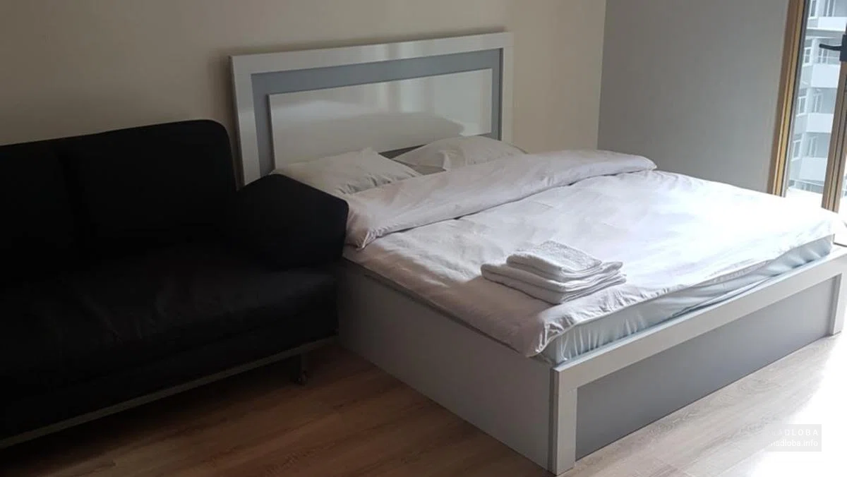 Bedroom at the ORBI PLAZA Hotel