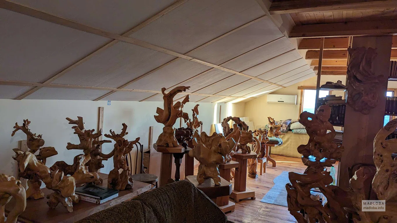 how in his hands the roots of ancient trees turn into sculptural masterpieces