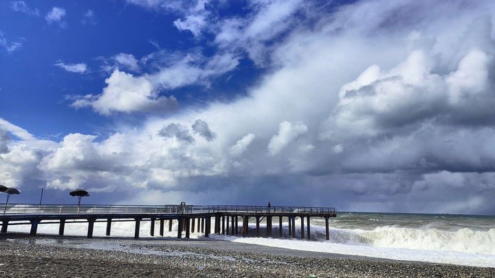 The beach to the right of the pier