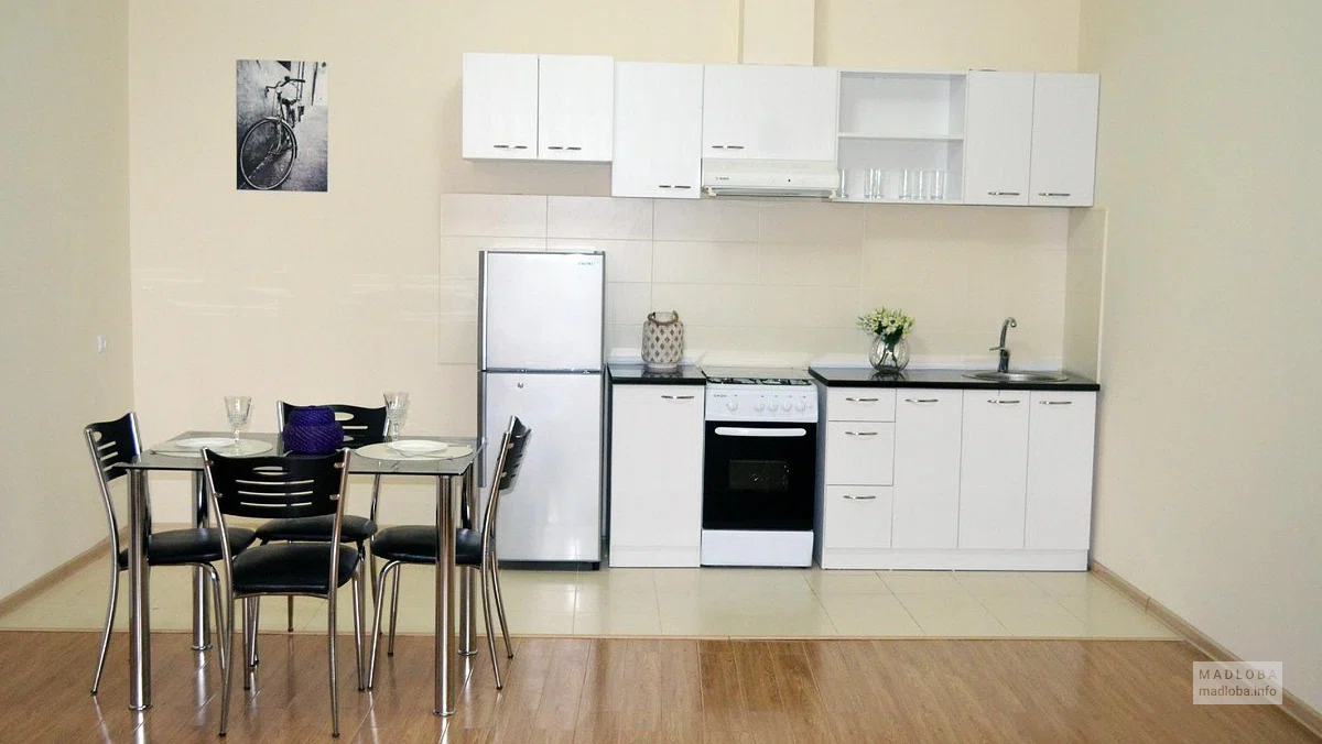Кухня в номере гостиницы Premium Residence