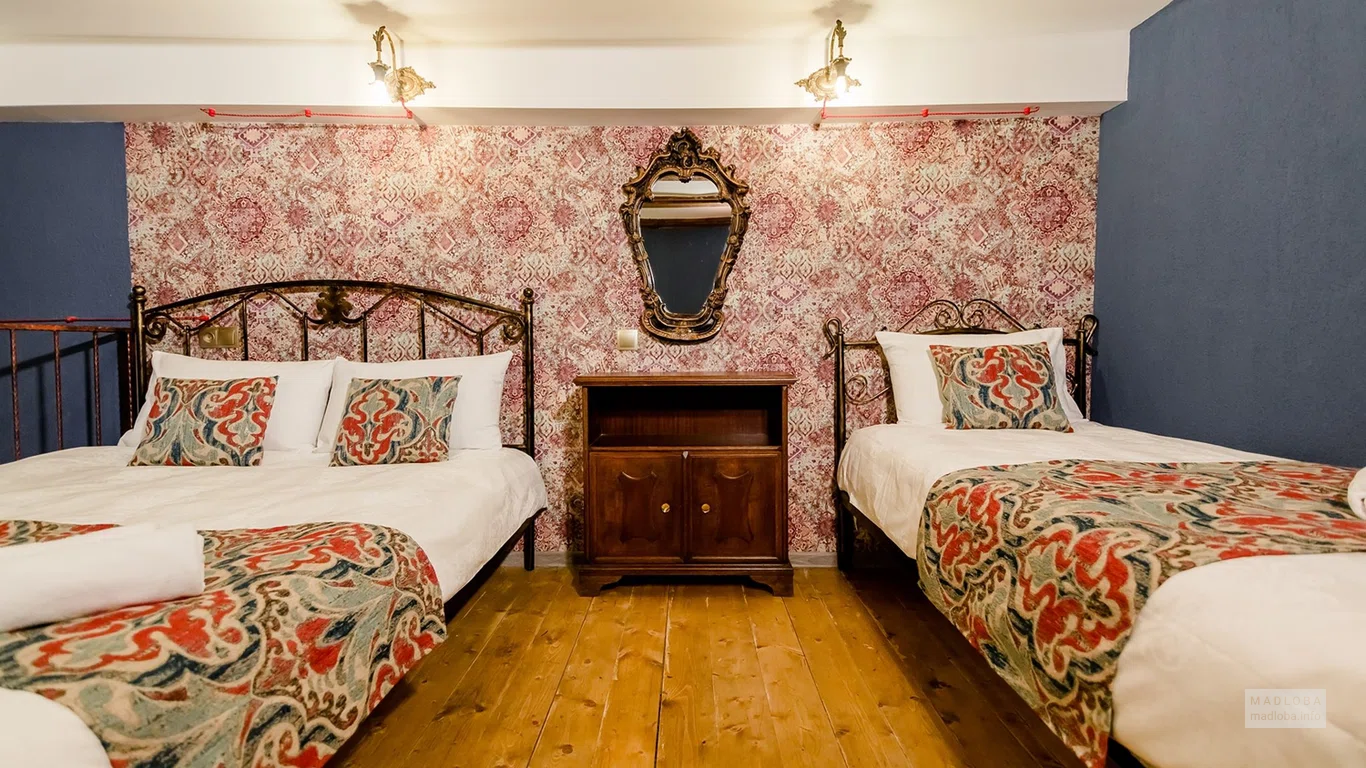 Кровати в отеле Tiflis Inn Boutique Hotel