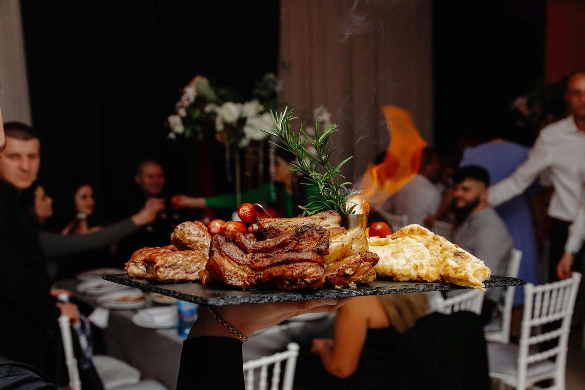 a-platter-of-food-with-a-fire-on-it.jpg