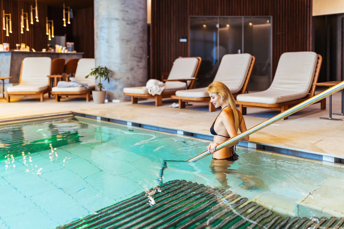 A woman prepares to relax in the spa area of the hotel