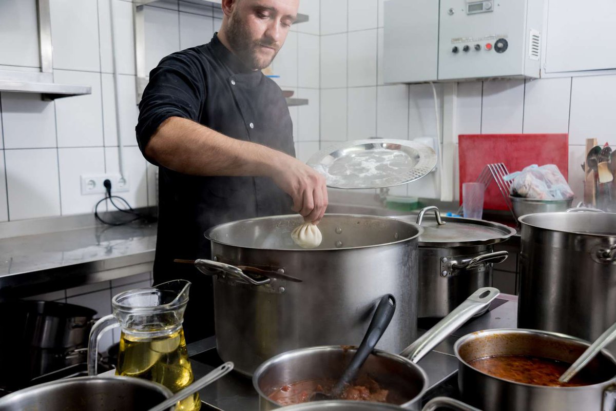 The chef prepares khinkali