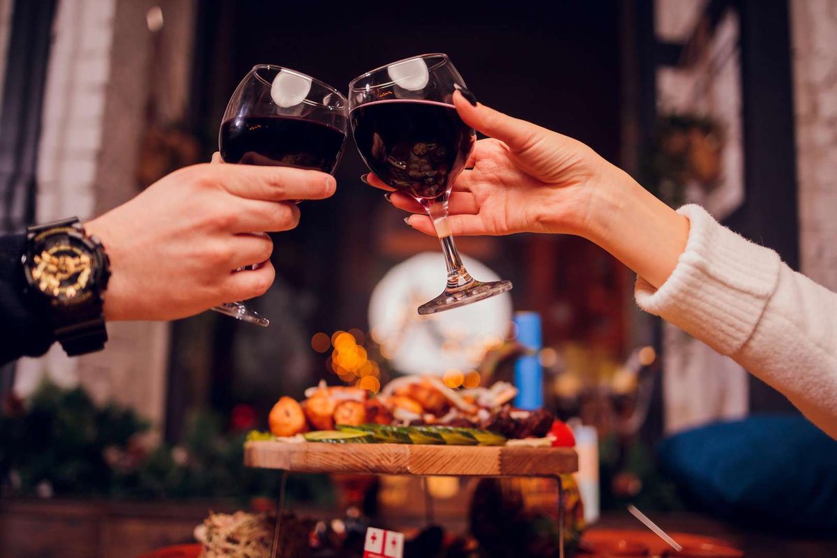 A couple drinks Georgian wine in a Georgian restaurant