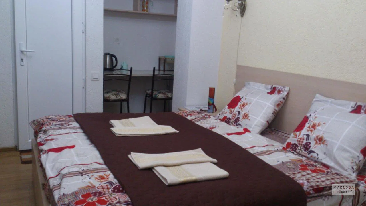 Кровать в номере Guest House Madonna