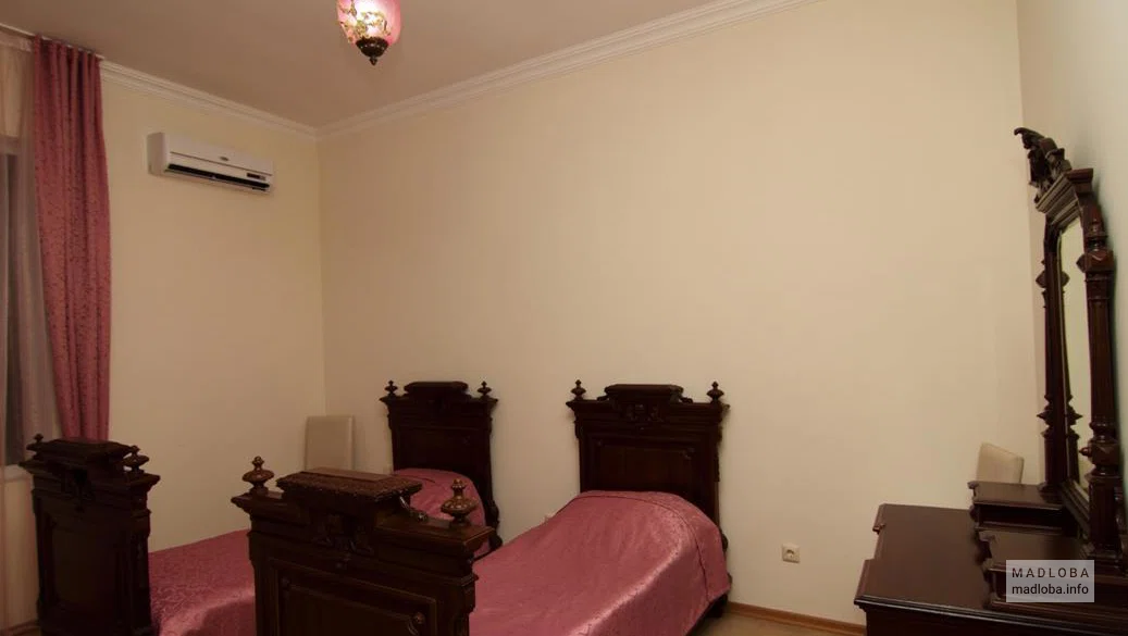 Интерьер спальни в Hotel Prime