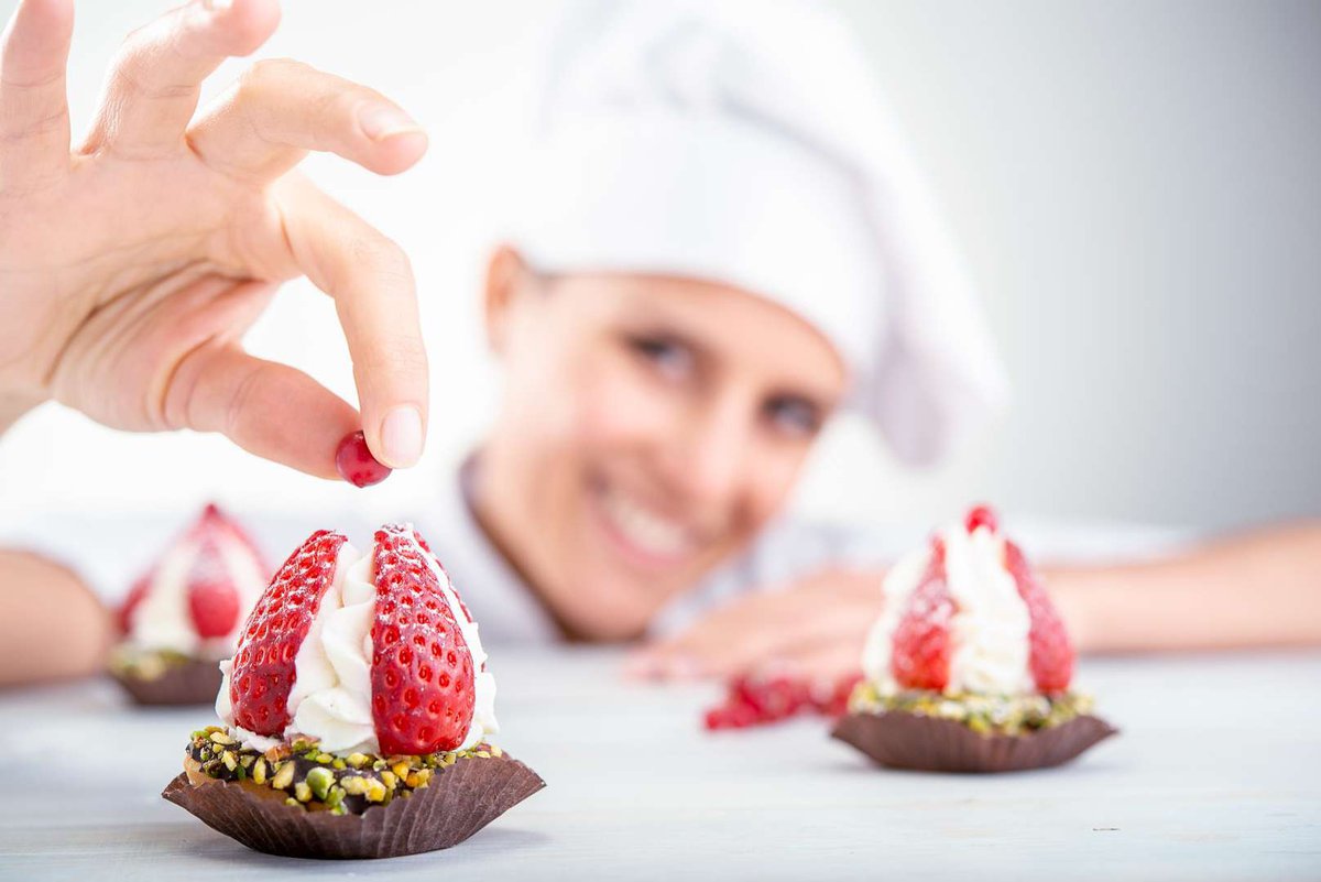The pastry chef is working on the dessert