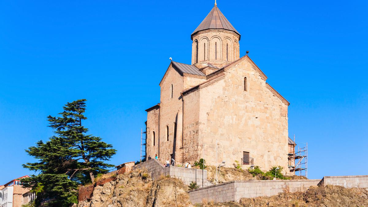 The building of the Cathedral of the Mother of God in Metekhi