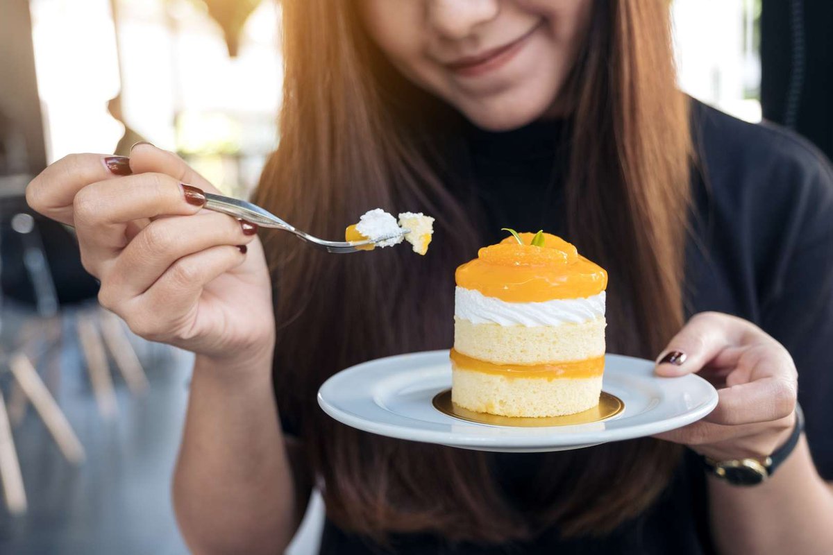 The girl with the fruit dessert